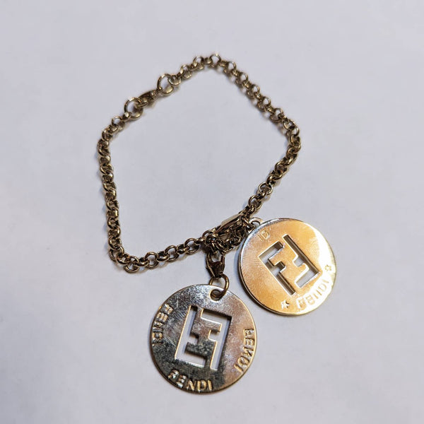 FENDI
GOLD DOUBLE COIN PENDENT