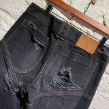 TELFAR BLACK DISTRESSED JEANS WITH PANELLED SEAMS