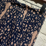 COMME DES GARCONS NAVY PRINT LEGGINGS