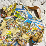 COMME DES GARÇONS 
“OKTOBERFEST” CARTOON PRINT T-SHIRT