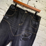 TELFAR BLACK DISTRESSED JEANS WITH PANELLED SEAMS
