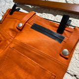 UNRAVEL PROJECT ORANGE LEATHER SKINNY TROUSERS