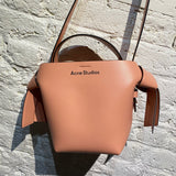 ACNE STUDIOS PINK LEATHER BUCKET BAG