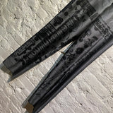 LEOMI SADLER GREY TROUSERS WITH PRINT