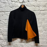 JW ANDERSON 
BLACK/ORANGE KNIT JUMPER