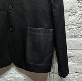 ALEXANDER MCQUEEN
MCQ
BLACK WOOL JACKET WITH LEATHER POCKETS