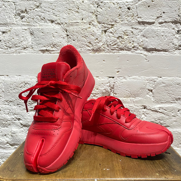 MAISON MARTIN MARGIELA X REEBOK
RED TABI TRAINERS