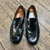 ACNE STUDIOS 
BLACK LEATHER LOAFERS WITH GOLD INITIALS