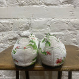 YUHAN WANG
WHITE FLORAL FLATS