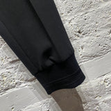 WOOYOUNGMI BLACK CUFF HEM TROUSERS