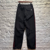 MCQ	BLACK ""UNIT DRONE"" PIPING TRACK BOTTOMS