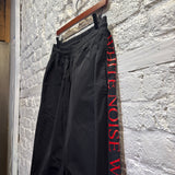 MCQ	BLACK ""UNIT DRONE"" PIPING TRACK BOTTOMS