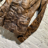 RICK OWENS 
DISTRESSED LEATHER JACKET
