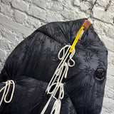 MONCLER X SIMONE ROCHA
EMBELLISHED BLACK DOWN COAT