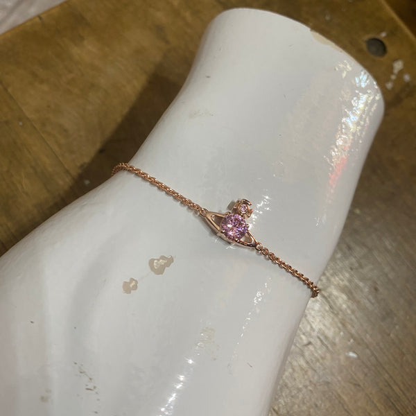 VIVIENNE WESTWOOD 
PINK GOLD PINK ORB BRACELET