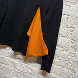 JW ANDERSON 
BLACK/ORANGE KNIT JUMPER