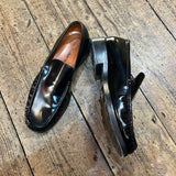 ACNE STUDIOS 
BLACK LEATHER LOAFERS WITH GOLD INITIALS