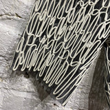 KASIA KUCHARSKA
MESH SCRIBBLE SHORTS
