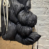 MONCLER X SIMONE ROCHA
EMBELLISHED BLACK DOWN COAT