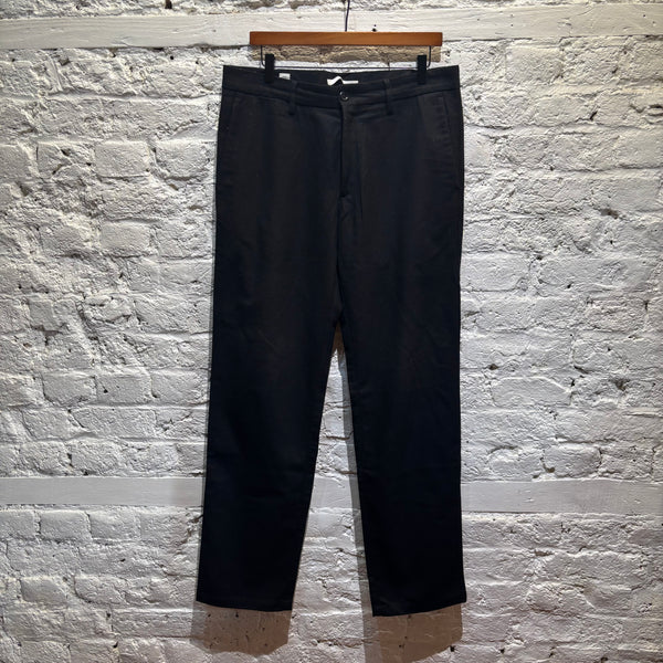 Norse Projects
black wool trousers