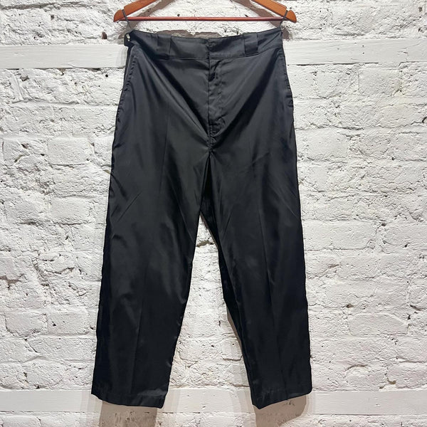 PRADA
BLACK NYLON TROUSERS