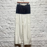 RAF SIMONS 
SAMPLE RECONSTRUCTED PINSTRIPE WOOL/WHITE COTTON TROUSERS