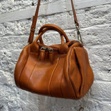 ALEXANDER WANG
ROCCO STUDDED LEATHER BAG DEEP ORANGE/TAN