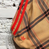 WALES BONNER X ADIDAS
TAN TARTAN RUNNING SHORTS