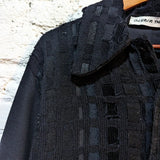 OLUBIYI THOMAS
CROPPED BLACK WOOL JACKET WITH HAND KNITTED/WOVEN REWEAVE FRONTS AND COLLAR