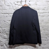 COMME DES GARÇONS
HOMME NAVY TWILL JACKET WITH CAMOUFLAGE LINING