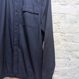 NORSE PROJECTS
NAVY POP BUTTON SHIRT