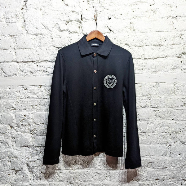 RAF SIMONS 
TO THE ARCHIVES BLACK L/S POLO SHIRT