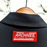RAF SIMONS 
TO THE ARCHIVES BLACK L/S POLO SHIRT