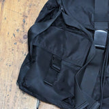 ALEXANDER MCQUEEN 
MCQ BLACK RUCKSACK RED HARNESS