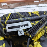 ALEXANDER MCQUEEN 
MCQ YELLOW/BLACK 3/4 TROUSERS