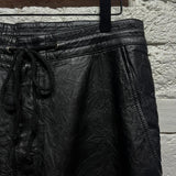 ALEXANDER MCQUEEN
MCQ
BLACK LEATHER 3/4 TROUSERS