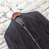 RICK OWENS 
BROWN SILK/KNIT PLEATED BACK BOMBER