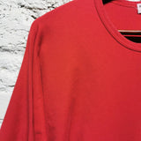 COMME DES GARCONS
ROBE DE CHAMBRE
RED TWISTED JERSEY DRESS