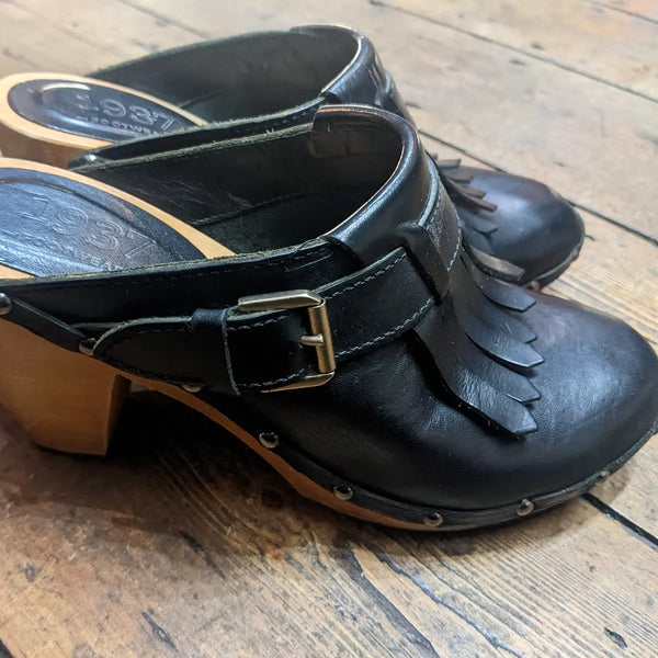 1937
LEATHER MULES BLACK WITH BUCKLE & FRINGE & WOODEN BLOCK HEEL